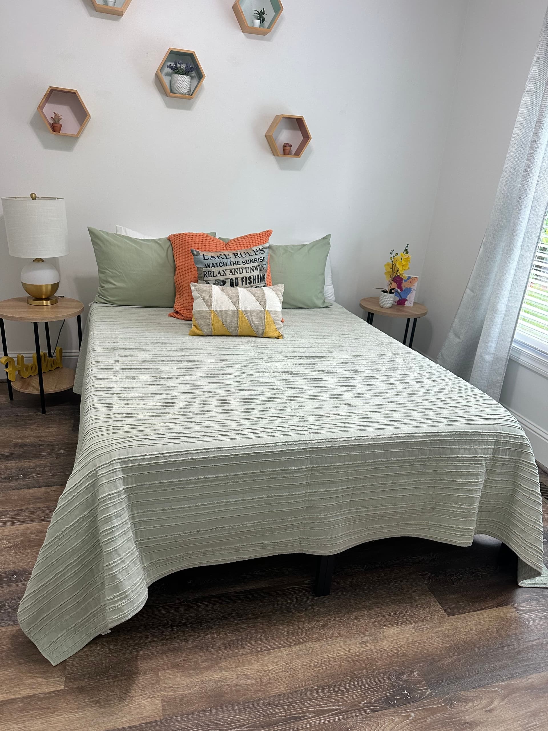 A guest bedroom made up with fresh linens after a turnover clean